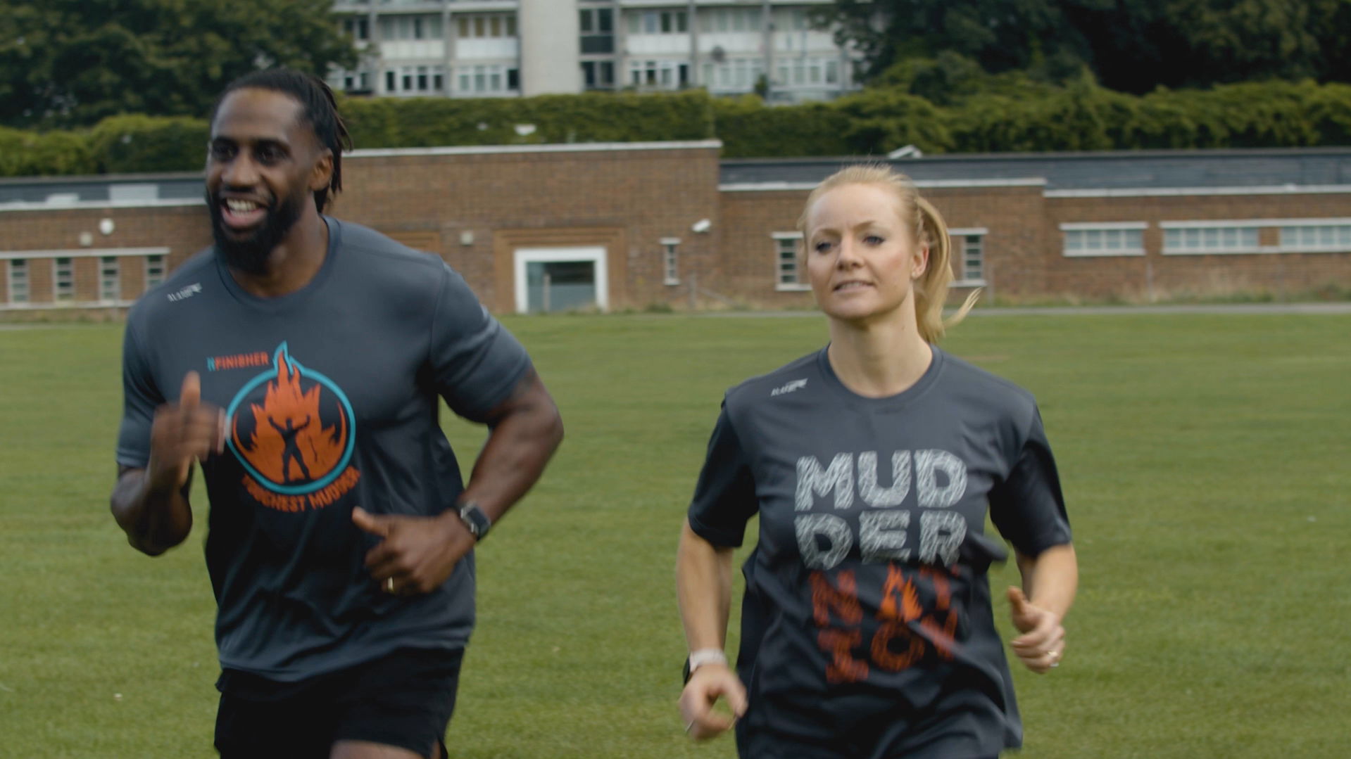 A man and woman running