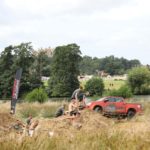 isuzu in mud and castle backdrop