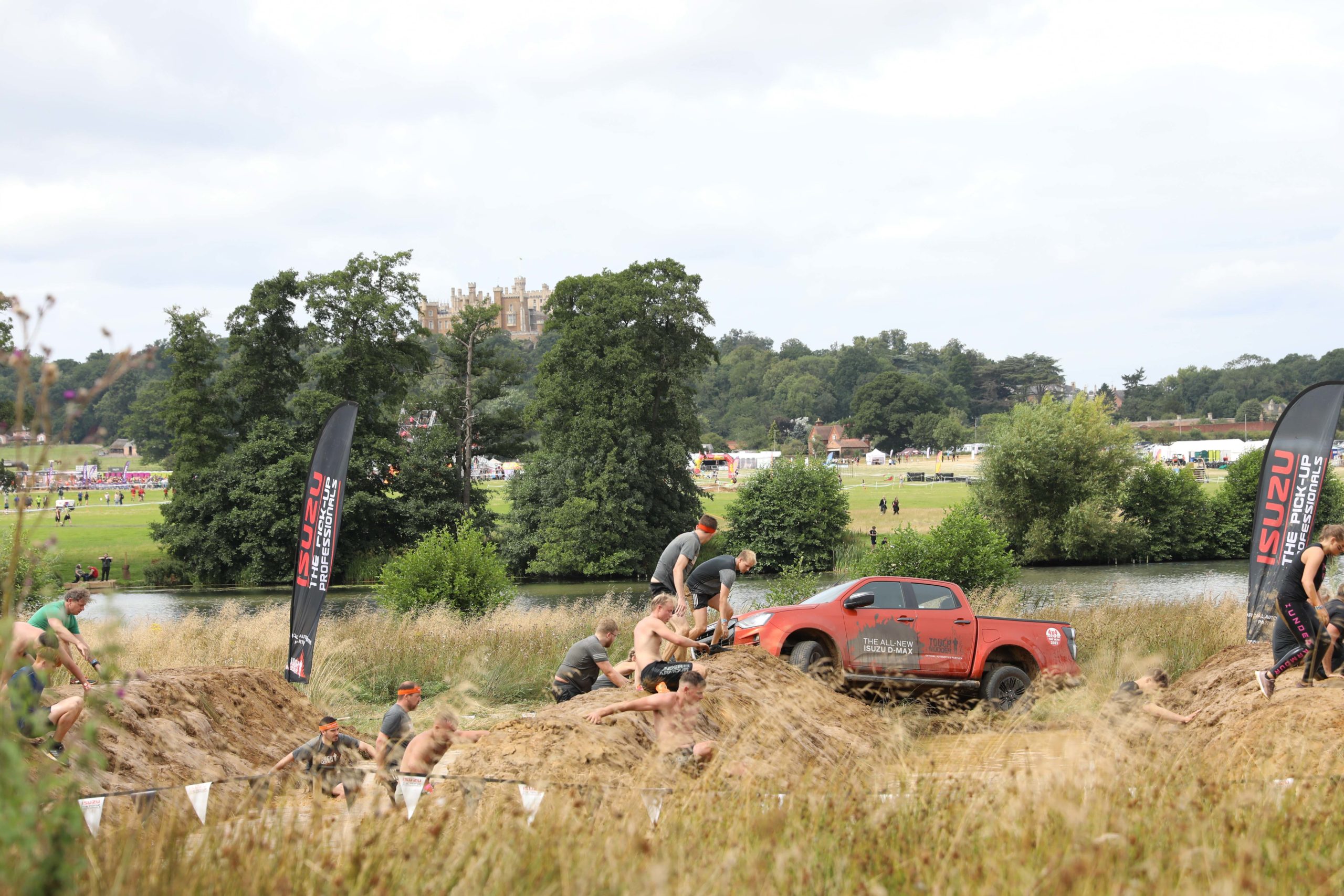 isuzu in mud and castle backdrop