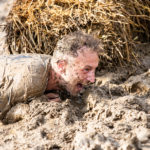 man stuck in mud