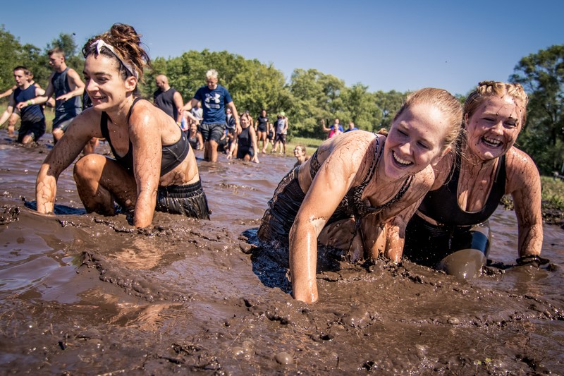 girls crawling in mud