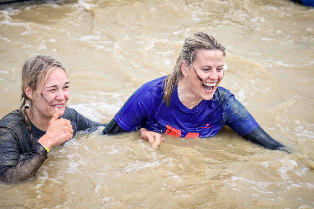 two women in water at Tough Mudder