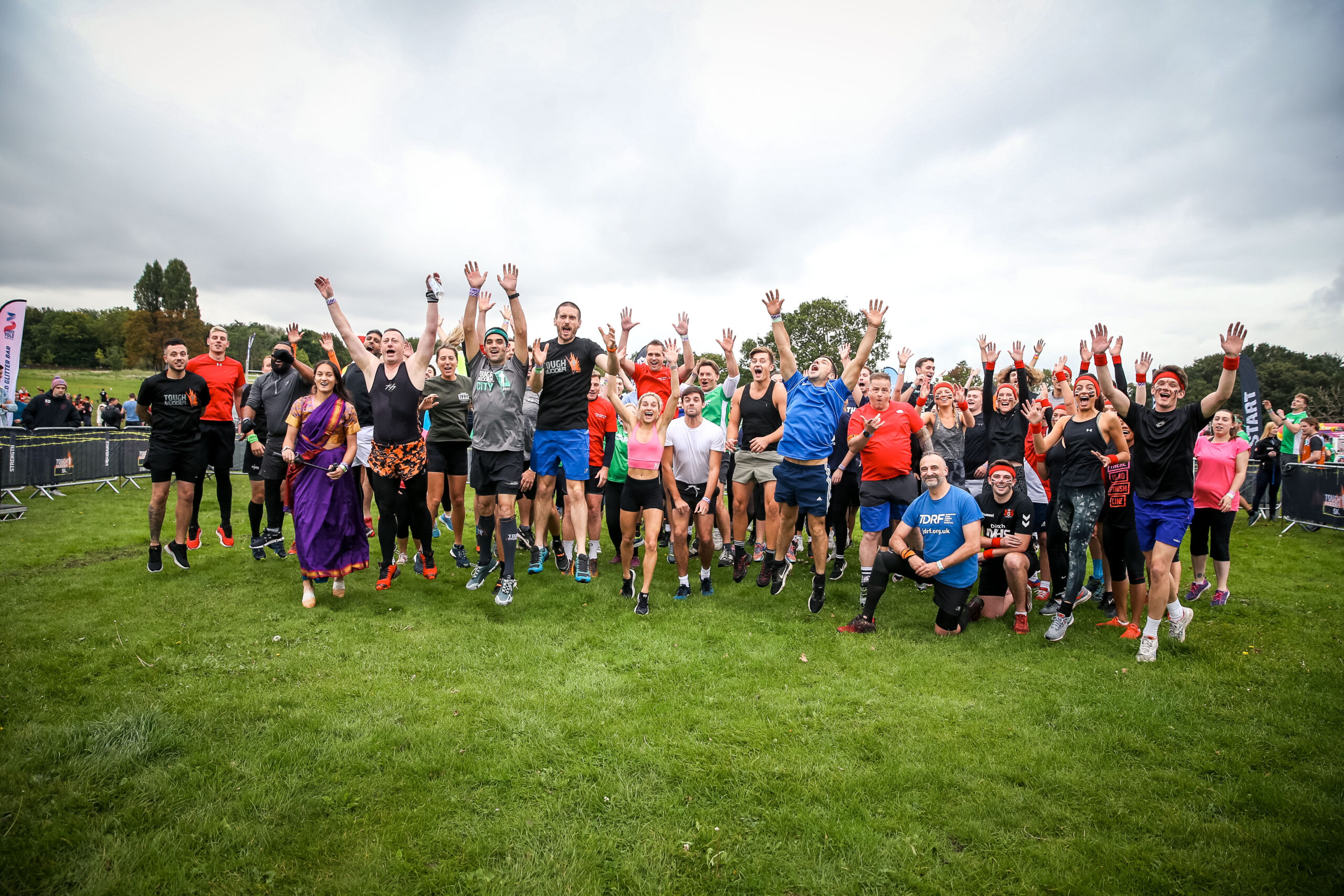 people jumping at morden park tough mudder