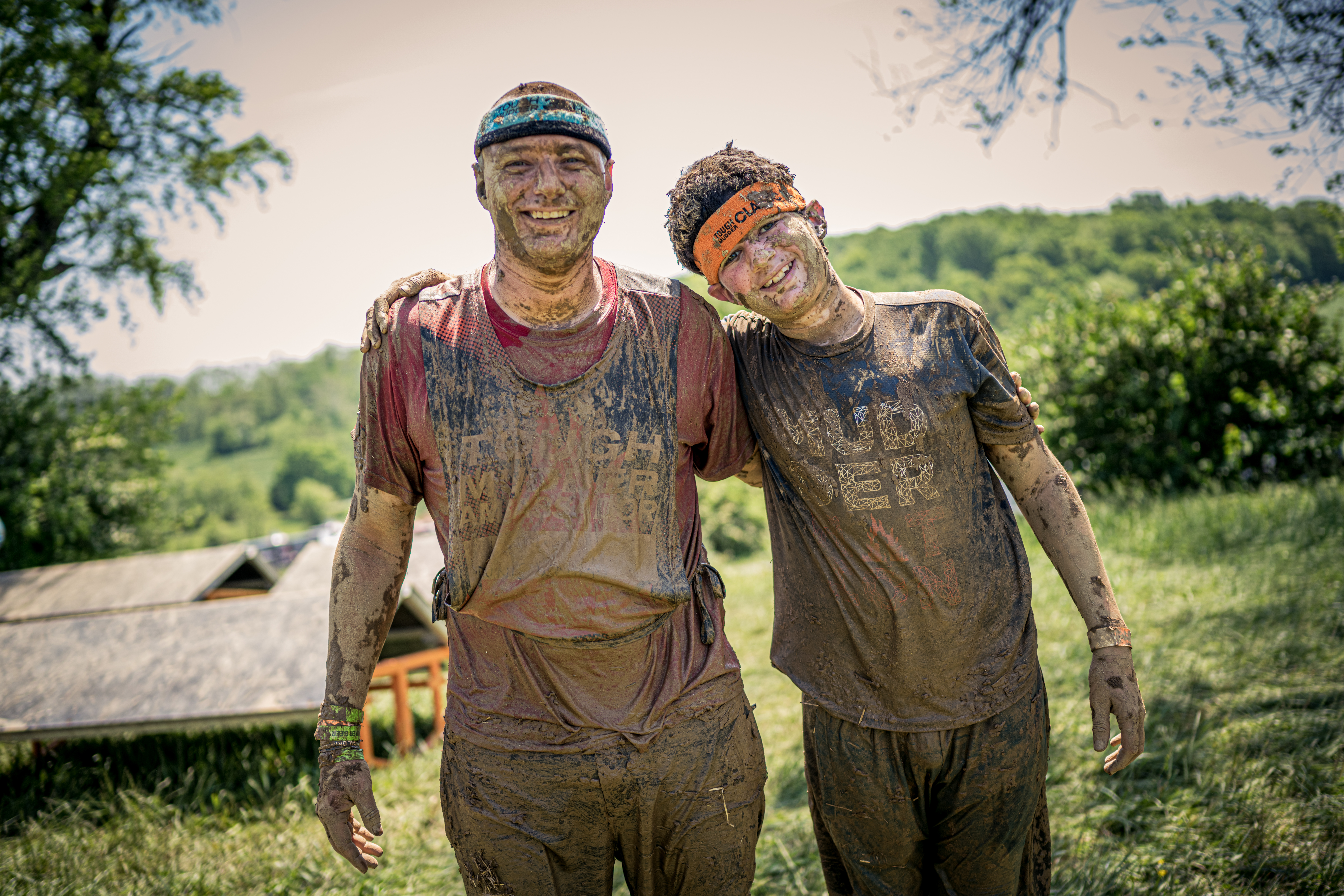 dad and son at Tough Mudder event
